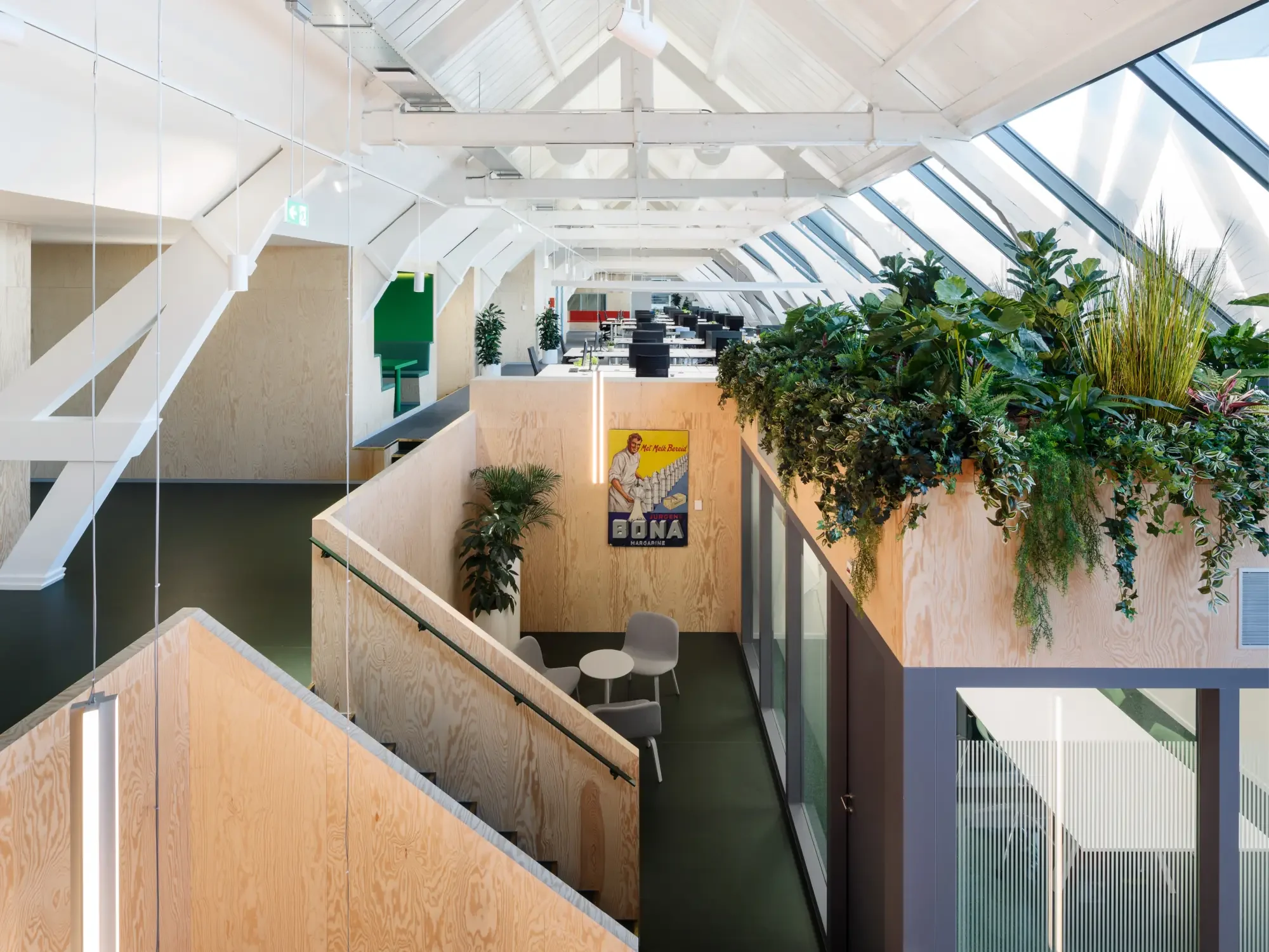 The interior of a building re-imagined as an office.